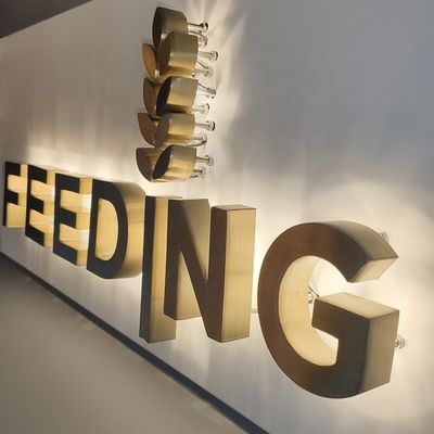 Dấu hiệu chữ viết có đèn nền bằng thép không gỉ bằng vàng